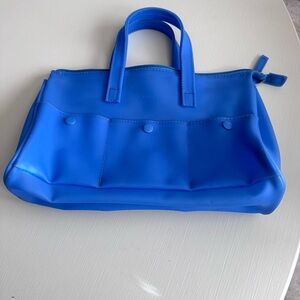 Blue plastic rubber electic handbag